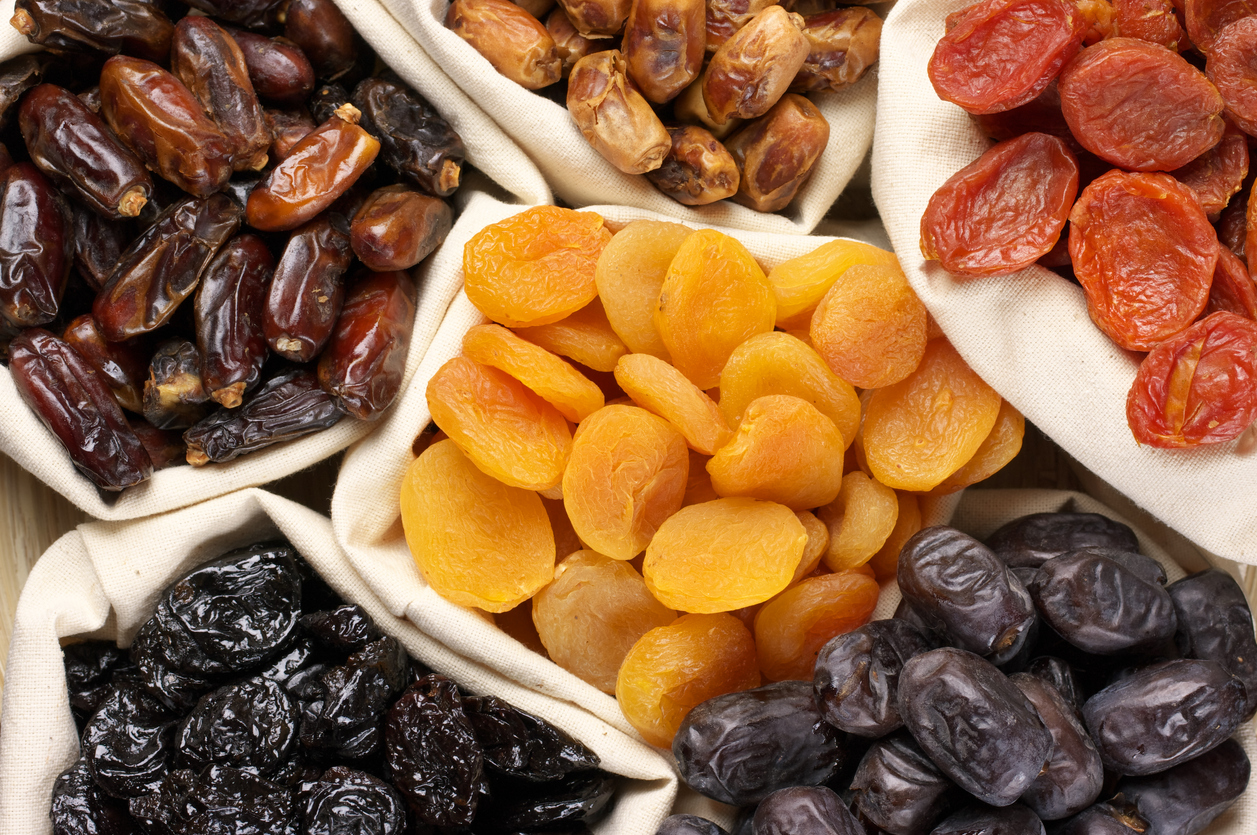 Organic dates and apricots in hessian bags